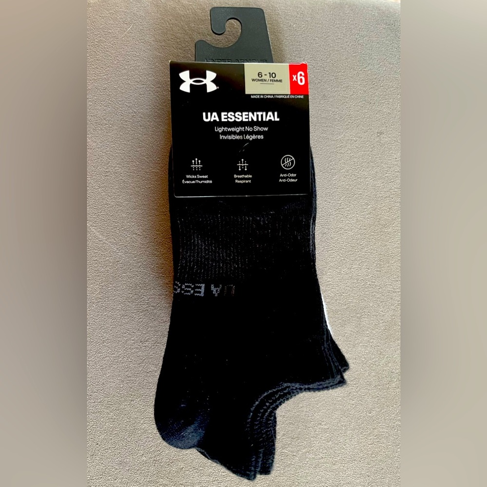 Under Armor Essential. Light No Show socks. 3 black, 3 white. Brand new